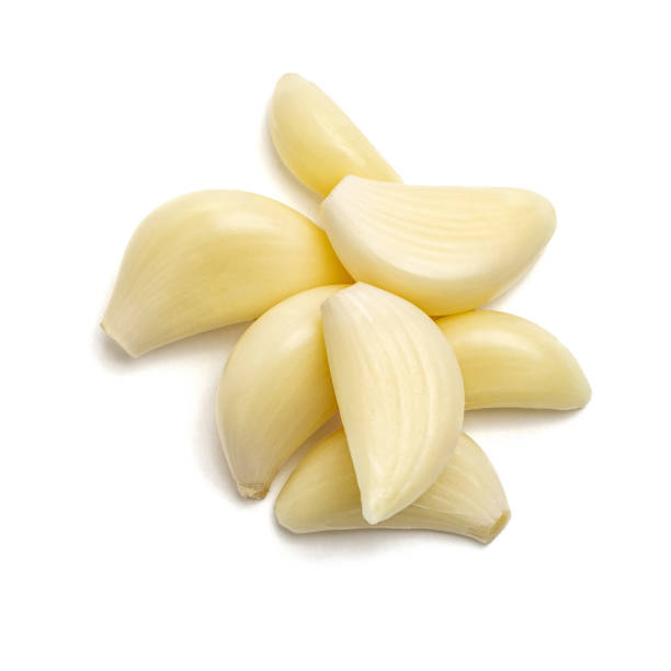 Isolated garlic. Raw garlic segment isolated on white background. Top view.
