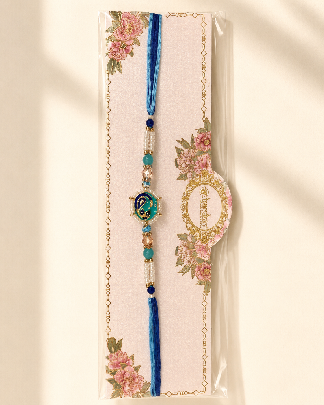 Rakhi/ Raki Peacock Round with Beads ( Online Exclusive)