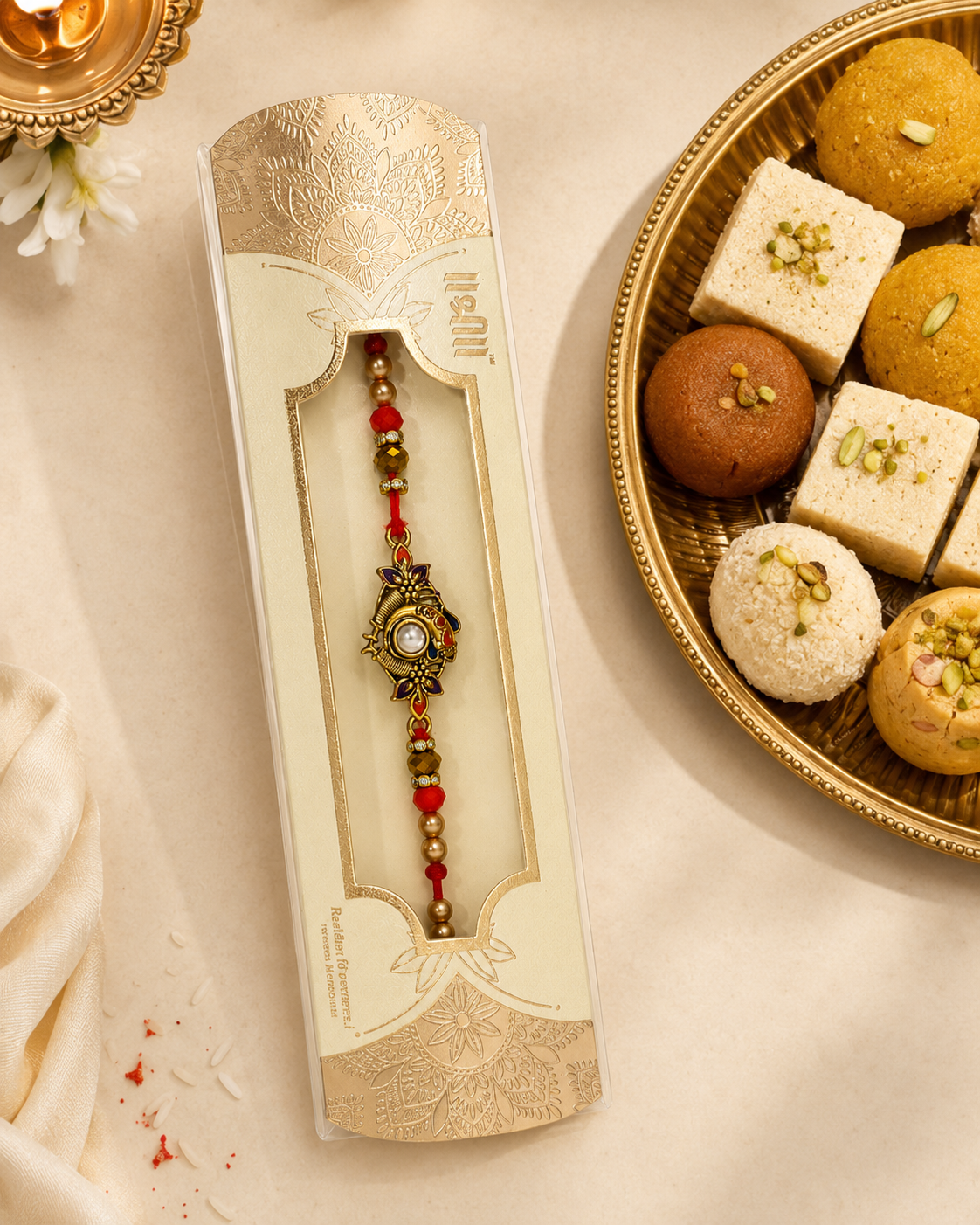 Rakhi/ Raki Ganesha with Peral and Beads (Online exclusive)
