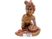 Krishna idol brown