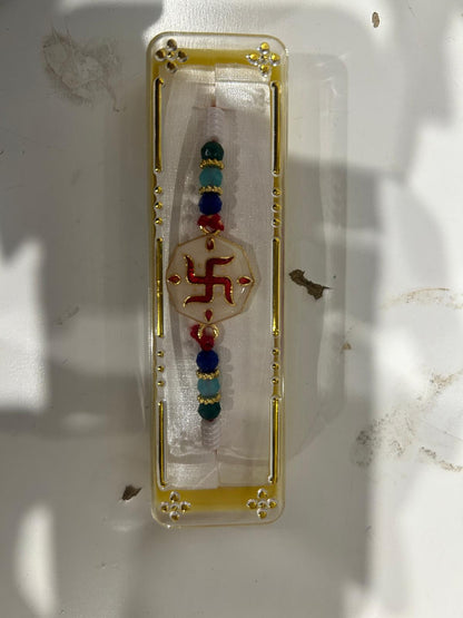 Rakhi/ Raki Multi Colour Swastik with Beads (Online exclusive)